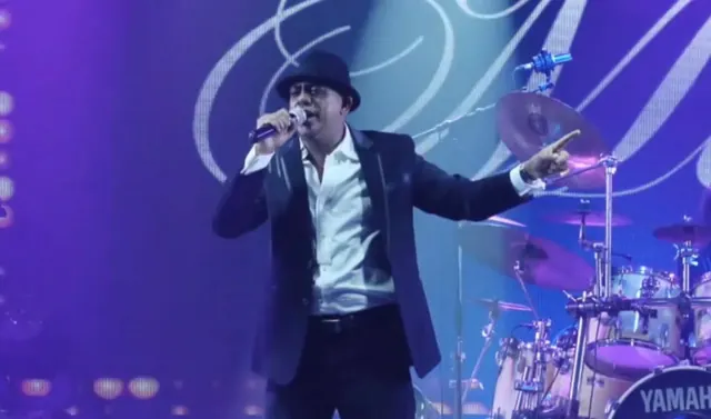 The band performing live